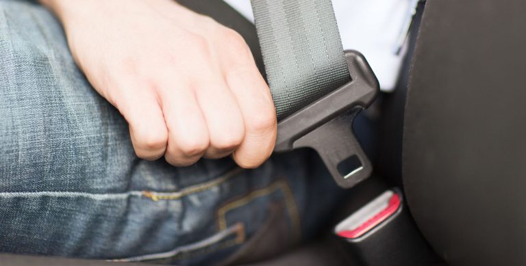 fastening a seatbelt